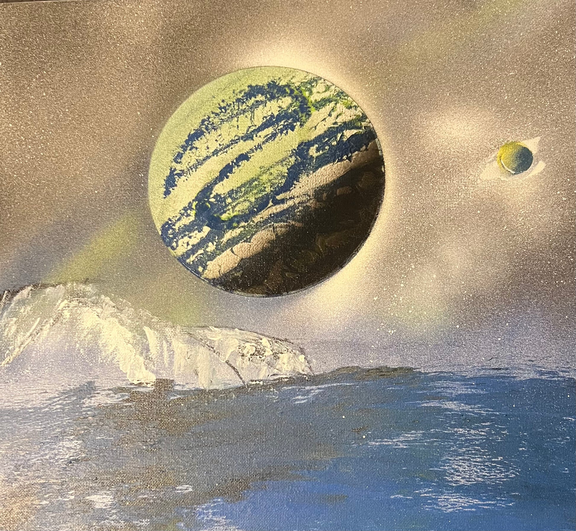 canvas painting of planet satellite over ice-burg in ocean